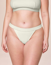 Load image into Gallery viewer, nueskin Tess Rib Cotton Mid-Rise Thong in color Cannoli Cream (Cannoli Cream) and shape thong
