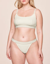 Load image into Gallery viewer, nueskin Tess Rib Cotton Mid-Rise Thong in color Cannoli Cream (Cannoli Cream) and shape thong
